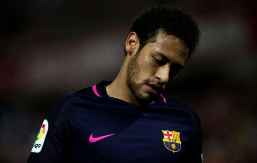Barcelona's Neymar was shown the first red card of his Barcelona career for two bookable offences in defeat at Malaga