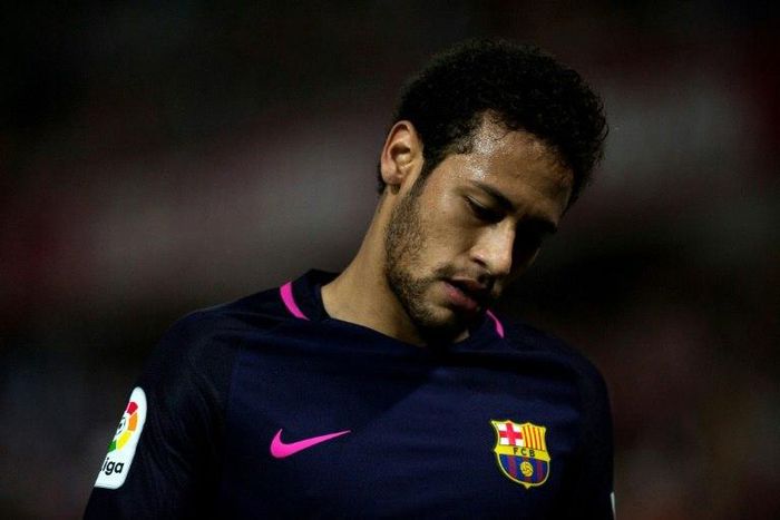 Barcelona's Neymar was shown the first red card of his Barcelona career for two bookable offences in defeat at Malaga