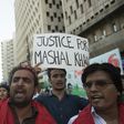 Activists shout slogans during a protest in Karachi on April 14, 2017, against the killing of student Mashal Khan by his classmates