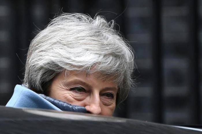 British Prime Minister Theresa May pledged to step down if MPs back her EU divorce deal