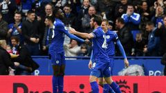 Leicester City's Wilfred Ndidi (L) celebrates scoring their opening goal against Stoke City at King Power Stadium in Leicester, central England on April 1, 2017