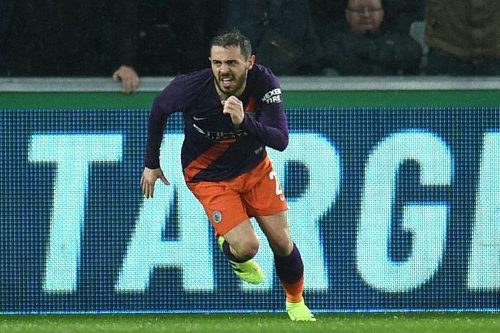 Eyes on the prizes: Bernardo Silva celebrates after scoring Manchester City's first goal in their 3-2 FA Cup quarter-final win away to Swansea