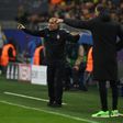 Monaco's head coach Leonardo Jardim (L) and Dortmund's Thomas Tuchel react on the sideline during their UEFA Champions League quarter-final 1st leg match, in Dortmund, on April 12, 2017