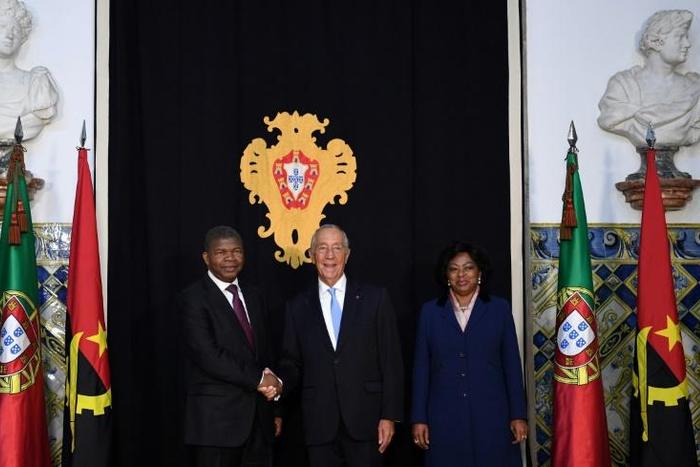 Angolan President Joao Lourenco paid a landmark visit to Lisbon in November meeting Portuguese president Marcelo Rebelo de Sousa (C)