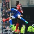 Sunderland's Victor Anichebe (R) challenges Bournemouth's English defender Adam Smith (L) during their Premier league match at the Stadium of Light in Sunderland, north-east England on April 29, 2017