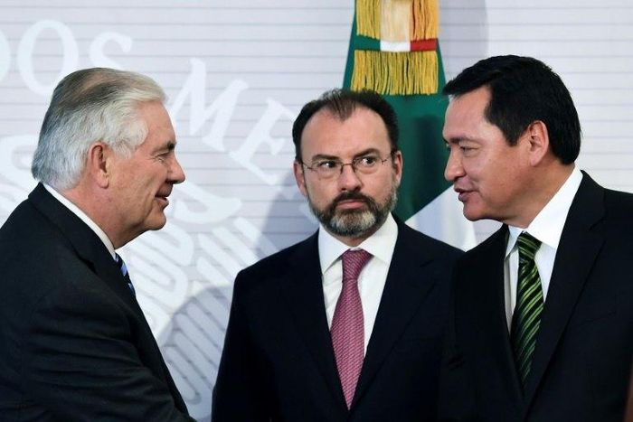(L-R) US Secretary of State Rex Tillerson, Mexican Foreign Minister Luis Videgaray and Mexican Interior Minister Miguel Angel Osorio Chong greet each other during a press conference at the Foreign Ministry building in Mexico City on February 23, 2017