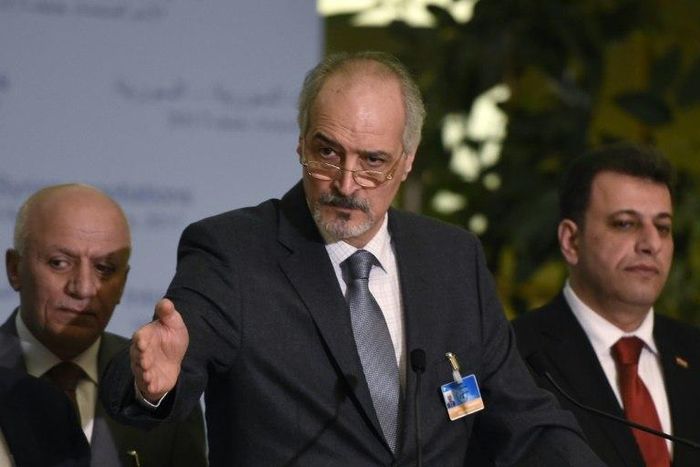 Syrian chief negotiator Bashar al-Jaafari (C), Ambassador of the Permanent Representative Mission of Syria to UN New York, speaks at a press conference on the Intra-Syria peace talks at the Palais des Nations in Geneva on March 2, 2017