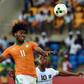 DR Congo's Neeskens Kebano (back) challenges Ivory Coast's Franck Kessie in Oyem on January 20, 2017