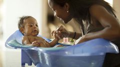 Bathing baby(thefertilechickonline)