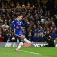 Chelsea's midfielder Eden Hazard scores his team's second goal during the English Premier League football match between Chelsea and Manchester City at Stamford Bridge in London on April 5, 2017