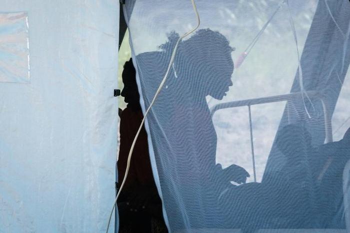 Patients with diarrhoea are seen at a treatment tent at Macurungo health centre in Beira, where at least 139 cholera cases have been reported, as health workers struggle with the cyclone aftermath