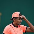 Australia's Nick Kyrgios clashed with the chair umpire and a heckler and admitted not trying after he lost 6-3, 6-1 to German qualifier Mischa Zverev