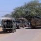 Kenyan soldiers arrive at the scene of a bomb attack claimed by Shabaab militants in the northeastern town of Mandera on October 25, 2016