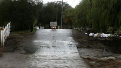 A road is blocked off due to floodwaters on January 23, 2017 in Santa Clarita, California