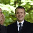 French President Francois Hollande (left) is pictured on Wednesday with his successor centrist Emmanuel Macron