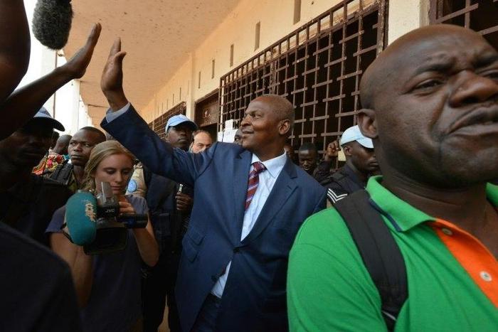 This week could offer Central African Republic President Faustin Archange Touadera (C) a lifeline, as donors come together in Brussels to plot the country's future