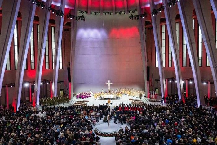 People attend an inaugural Mass in the Temple of Divine Providence in Warsaw on November 11, 2016
