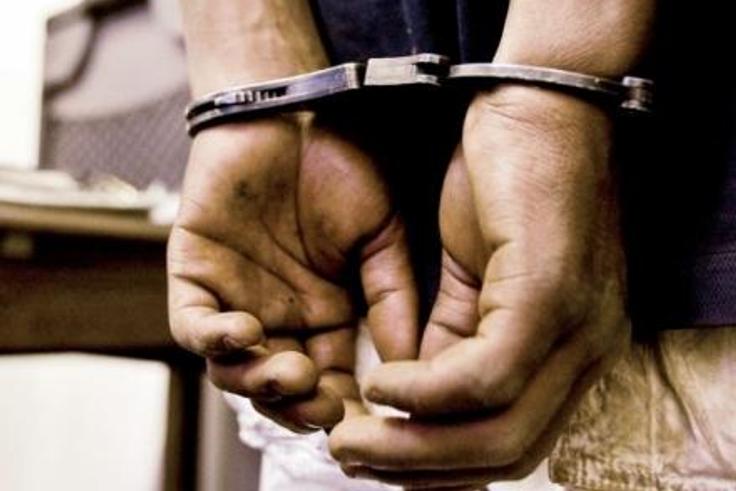 A man in handcuffs