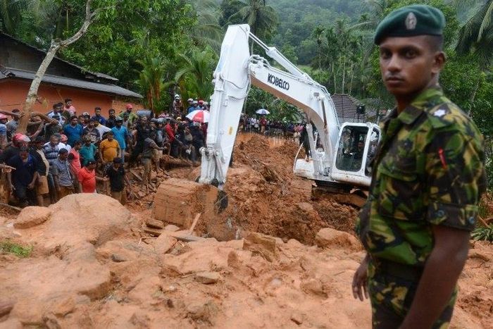 A Sri Lankan military rescue worker looks on during the search for survivors at the site of a mudslide in Bellana village in Kalutara