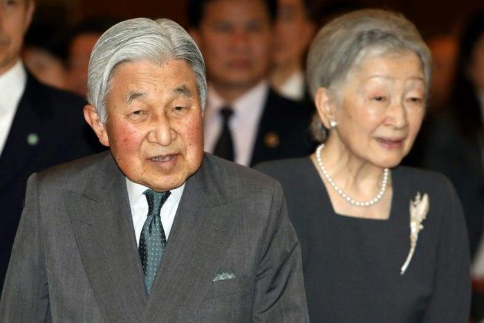 Japan's Emperor Akihito and Empress Michiko arrive for a meeting in Hanoi with family members of Japanese veterans living in Vietnam on March 2, 2017