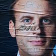 A vandalised campaign poster for French presidential election candidate Emmanuel Macron Emmanuel Macron is seen on May 5, 2017 in Paris