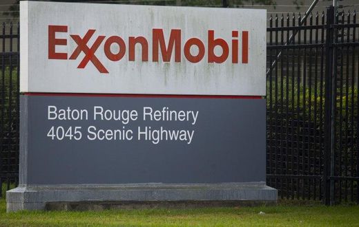 A sign is seen in front of the Exxonmobil Baton Rouge Refinery in Baton Rouge, Louisiana, November 6, 2015. REUTERS/Lee Celano