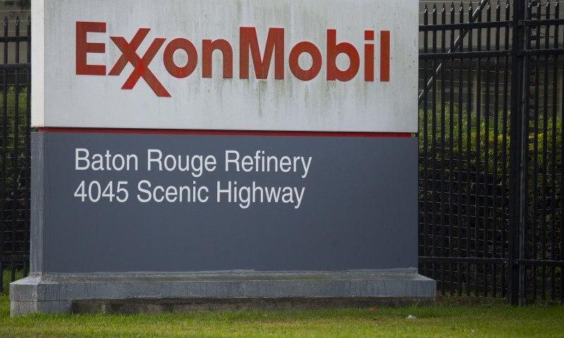 A sign is seen in front of the Exxonmobil Baton Rouge Refinery in Baton Rouge, Louisiana, November 6, 2015. REUTERS/Lee Celano
