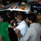 Volunteers move an injured blast victim from an ambulance at a hospital in the Hub district, some 40 kilometers from Karachi, on November 12, 2016