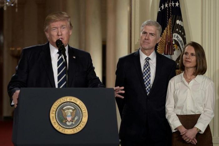 Judge Neil Gorsuch (C) and his wife Marie Louise look on, after US President Donald Trump nominated him for the Supreme Court, at the White House in Washington, DC