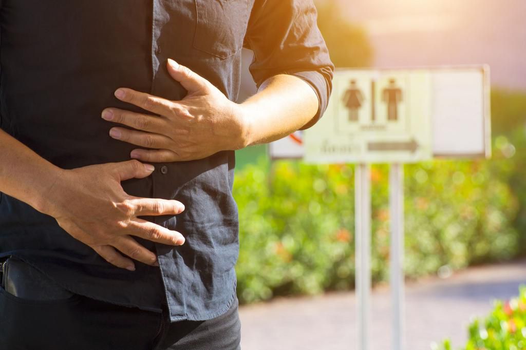 Male stomachache or Gastroenterologists / Concept with Healthcare And Medicine.