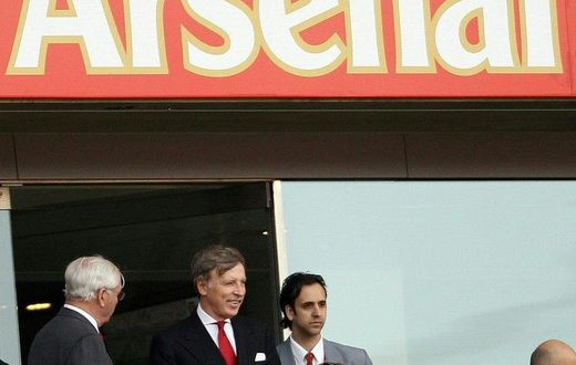 Arsenal majority owner Stan Kroenke (2nd L) looks on from the executive boxes during his team's Premier League game against Liverpool at the Emirates Stadium in London on April 17, 2011