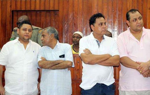 From left, Ibrahim Akasha Abdalla, Gulam Hussein, Vijaygiri Anandgiri Goswami and Baktash Akasha Abdalla follow proceedings in their case on December 13, 2016.