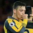 Arsenal's midfielder Mesut Ozil celebrates scoring his team's second goal against Middlesbrough on April 17, 2017