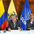 Colombia's ELN guerrilla member Pablo Beltran (L) speaks next to Ecuadorean government representative Juan Meriguet (C) and Colombia'a government representative Juan Camilo Restrepo, during a press conference in Quito on February 16, 2017