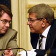 The International Monetary Fund head of delegation for Egypt, Chris Jarvis (L) and Egypt?s Minister of Finance Amr al-Garhy attend a joint press conference in Cairo on August 11, 2016