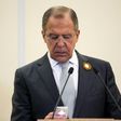 Russian Foreign Secretary Sergey Lavrov checks his smartphone during a 2015 press conference in Sochi, Russia