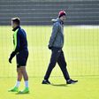 Arsenal's manager Arsene Wenger (R) and striker Alexis Sanchez are seen during a training session on March 6, 2017