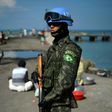 A Brazilian member of the UN peackeeping mission in Haiti patrols the Cite Soleil slum of the capital Port-au-Prince in this file photo