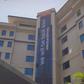 Banner draped over Dusit D2 Hotel after the facility was closed following a terror attack (Twitter)