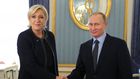Russian president, Vladmir Putin  shakes hands with French presidential candidate, Marine Le Pen.
