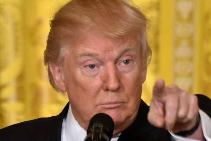 US President Donald Trump said there is "zero chaos" in his crisis-hit administration, and railed against enemies in the media, politics and the courts