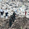 Sri Lankan military at the site of a collapsed garbage dump in Colombo on April 18, 2017
