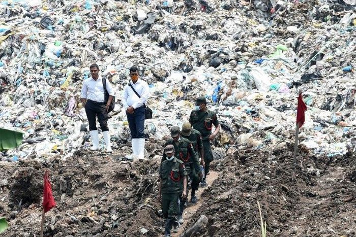 Sri Lankan military at the site of a collapsed garbage dump in Colombo on April 18, 2017