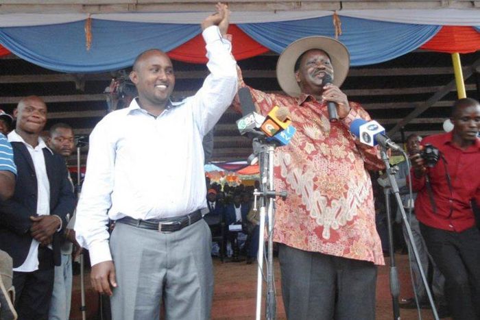 Suna East MP Junet Mohammed with ODM leader Raila Odinga at a past rally at Migori Stadium. Jubilee MPs claim the two were among beneficiaries of the NYS scandal.