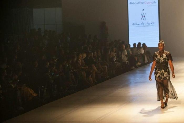 A plus-size model shows of a new creation by designer Aisha Abubakr from Aisha Abu-Bakr Luxury Design at the Lagos Fashion & Design Week in Nigeria on October 26, 2016