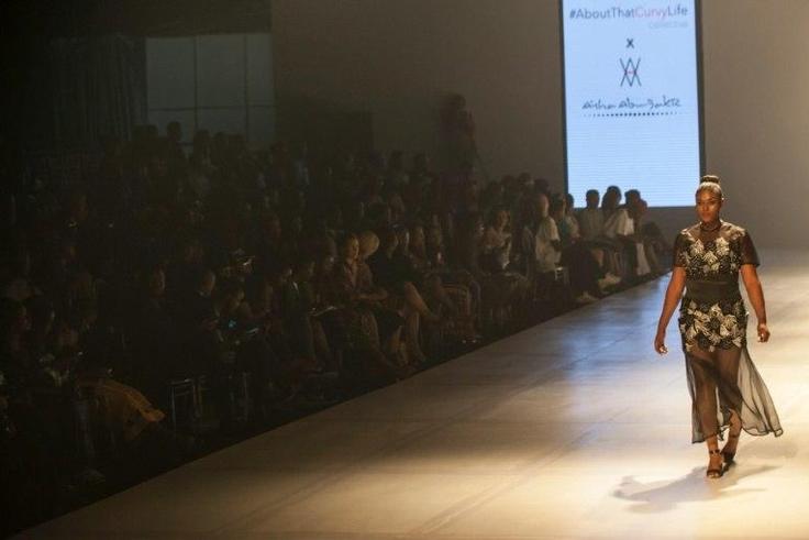 A plus-size model shows of a new creation by designer Aisha Abubakr from Aisha Abu-Bakr Luxury Design at the Lagos Fashion & Design Week in Nigeria on October 26, 2016