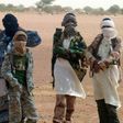 Fighters with the Ansar Dine Islamic group pictured Kidal, northern Mali as Burkina Faso's foreign Minister Djibrille Bassole meets with their leader on August 7, 2012
