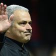 Manchester United's manager Jose Mourinho waves to the fans at Old Trafford stadium on February 16, 2017