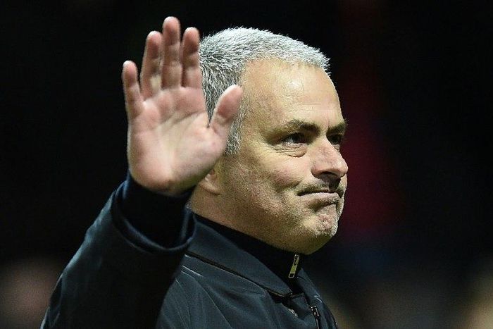 Manchester United's manager Jose Mourinho waves to the fans at Old Trafford stadium on February 16, 2017