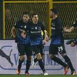 Atalanta's defender Mattia Caldara (2ndR) celebrates with his teammates after scoring during the Italian Serie A football match against As Roma on November 20, 2016
